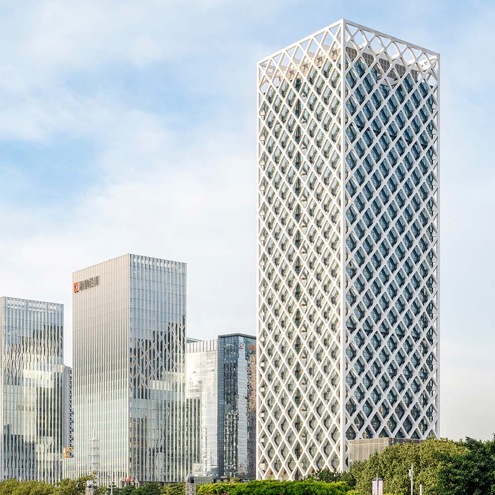 A view of the completed building from a nearby park