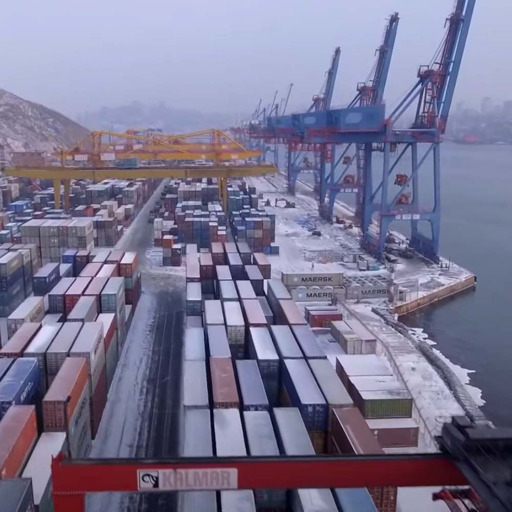 A screenshot of containers at a snowy port