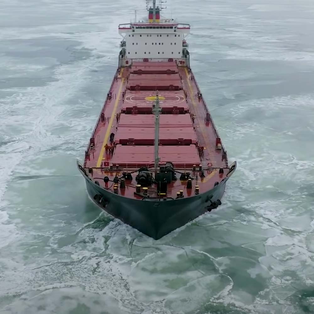 An icebreaker moving through pancake sea ice